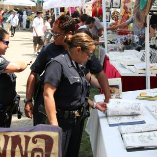 Police Officers Promote Literacy at Community Event