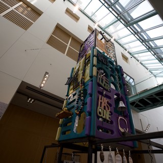 Colorful Sculptural Tower Installation in Museum Atrium
