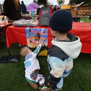 Curious Toddlers Discover Balloon Festival Poster