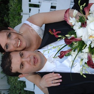 Newlyweds Share a Joyful Moment on Their Wedding Day