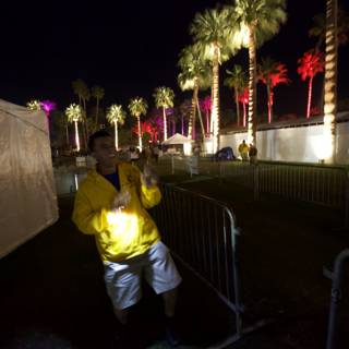 Yellow Jacket Man at Coachella Fence