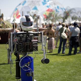 Helmeted Robot in the Coachella Crowd