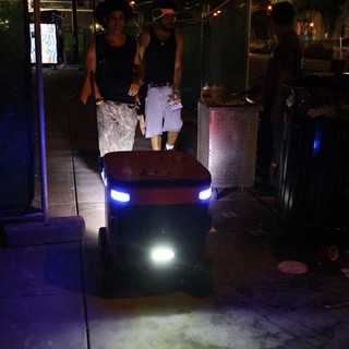 Autonomous Delivery Robot Navigates Nighttime Festival Crowd