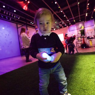 Toddler at Baby Rave Light Show Event