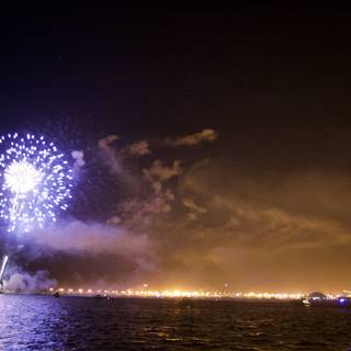 Boats Witness Fireworks Display over the Water