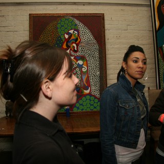 Art Gallery Evening With Three Women Amid Vibrant Paintings