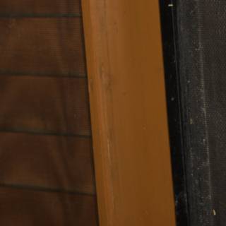 Rustic Wooden Door with Black Handle