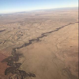 Serene Desert and Flowing River
