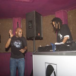 MC Q and a Friend at the DJ Booth