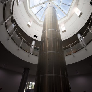 Modern Cylindrical Elevator Shaft with Geometric Skylight