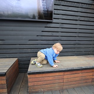 Toddler Climbing Modern Wooden Deck Stairs