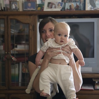 Mother and Baby Share a Playful Moment at Home