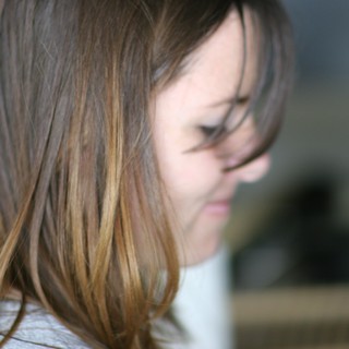 Young Girl Lost in Thought, Hair Falling Forward