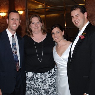 Joyful Wedding Reception Celebration with Four Guests