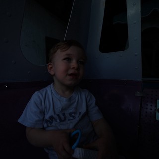 Young Child's Wonder at Fantasyland Attraction