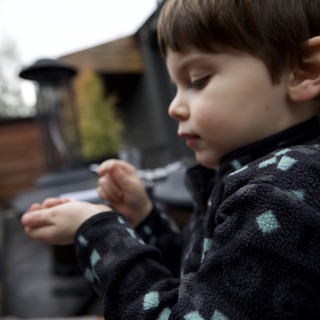 Young Child in Cozy Patterned Fleece at Home