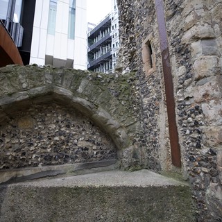 Ancient Roman Wall Ruins Amid Modern London Architecture