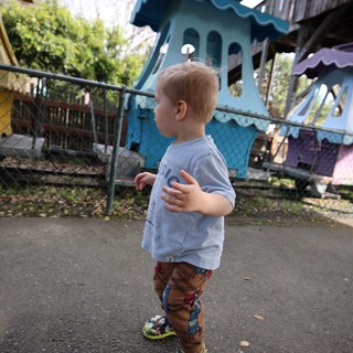 Young Child Explores Whimsical Fantasy Playground