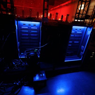 Dual Lighting Racks Glow Blue Backstage at Wobbleland