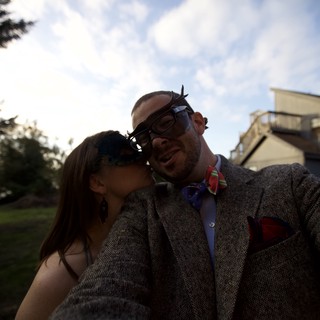 Masked Couple Shares a Tender Moment at Wedding