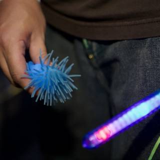 Nocturnal Playtime with Glowing Stick and Toy