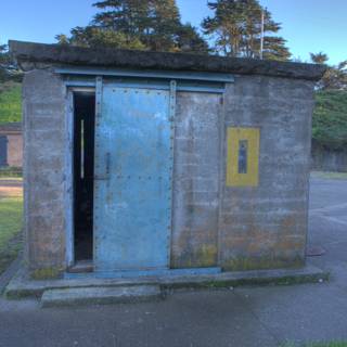 Blue and Yellow Cabin in the Countryside