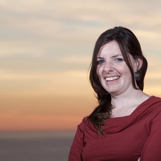 Smiling Woman at Golden Hour Sunset