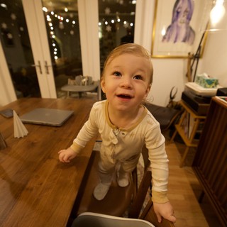 Joyful Toddler Exploring at Christmas Time