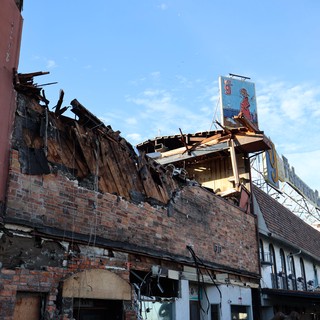 Aftermath of Urban Building Fire and Demolition
