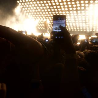Phone-Wielding Crowd at Rock Concert