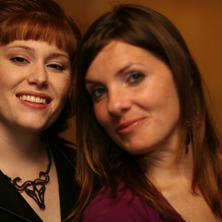 Two Women Share a Warm Moment Together