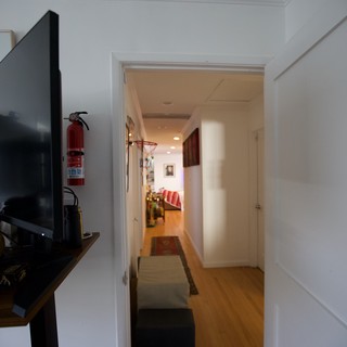 Modern Apartment Hallway Leading to Cozy Living Space