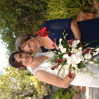 Bride and Elder Woman Share Wedding Day Bouquet