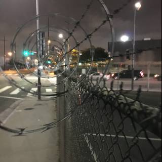 Nighttime Barbed Wire Fence in Los Angeles