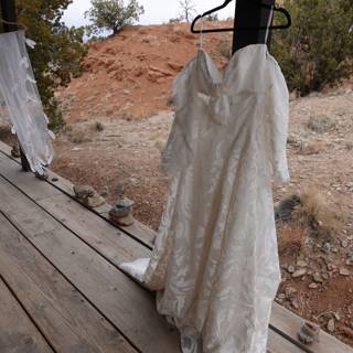Elegant Wedding Gown on Wooden Porch