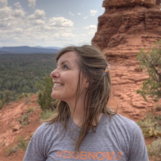 Woman Gazing Upward Amid Sedona Red Rock Formations