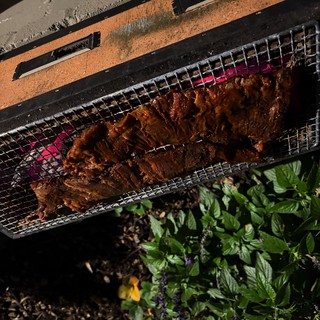 Grilled Fish Over Charcoal with Fresh Herbs