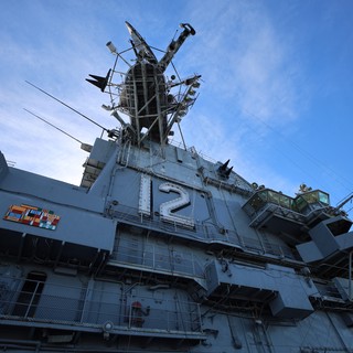 USS Hornet Island Superstructure Rising Against Blue Sky