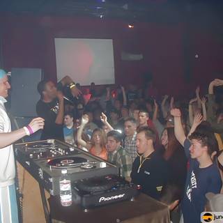 DJ rocks the nightclub crowd