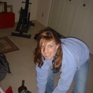 Woman Packing Bags in a Home Living Room