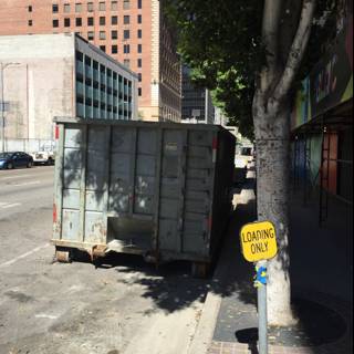 Abandoned Dumpster on City Street