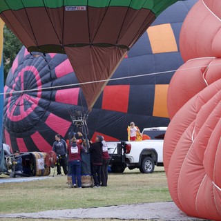 Ground Crew Prepares Hot Air Balloons for Launch
