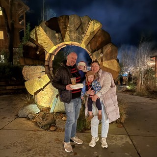 Family Christmas Portrait at Illuminated Turkey Sculpture