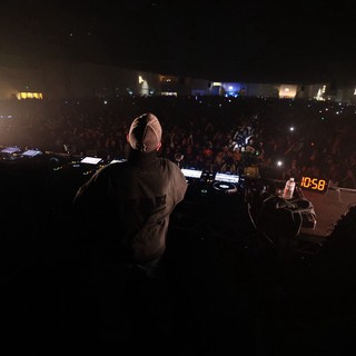 DJ Commands Massive Festival Crowd at Midnight