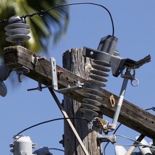 Weathered Electrical Pole with Insulators and Hardware
