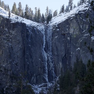 Frozen Waterfall Cascading Down Yosemite's Granite Cliffs