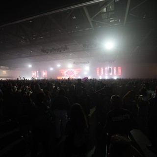 Massive Crowd Surges Toward Glowing EDM Festival Stage