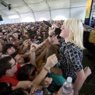 Woman with Blonde Hair Takes Coachella by Storm