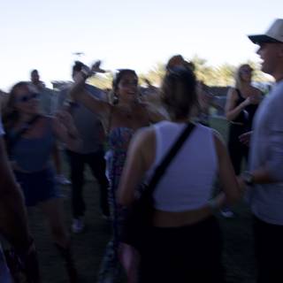Joyful Blur: Revelers at Coachella 2024