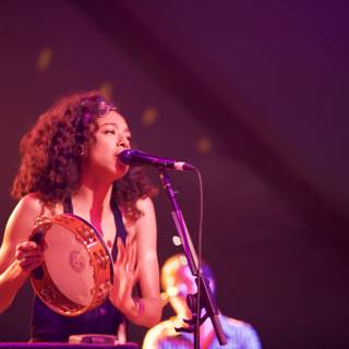 Corinne Bailey Rae's Lively Performance with her Guitar and Tambourine